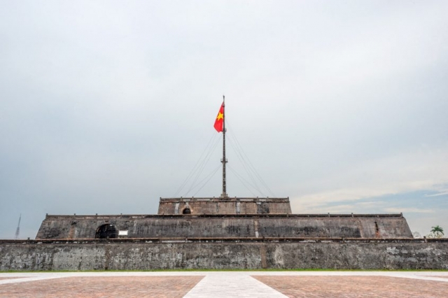 The Flag Tower, completed in 1807, stands across from the Meridian Gate to the Imperial Citadel in Hue, Vietnam.